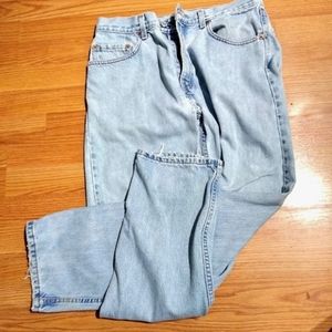 Levi's 505 light wash, slightly distressed, regular straight jeans. Men's 33/32